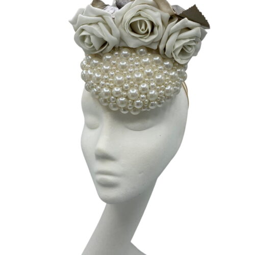 Stunning small pearl encrusted headpiece with ivory and silver flower detail.